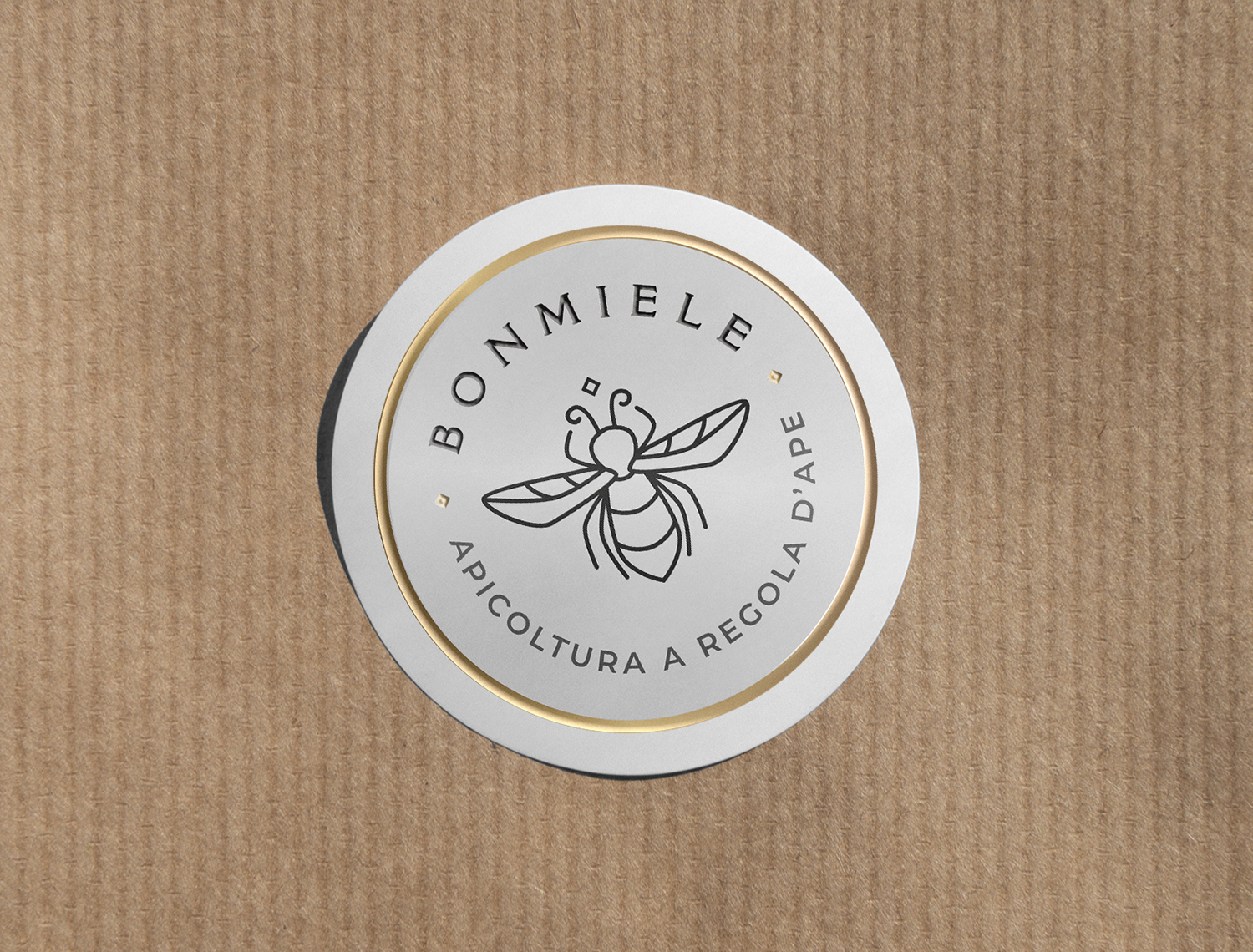 Bonmiele circular logo printed on textured kraft paper