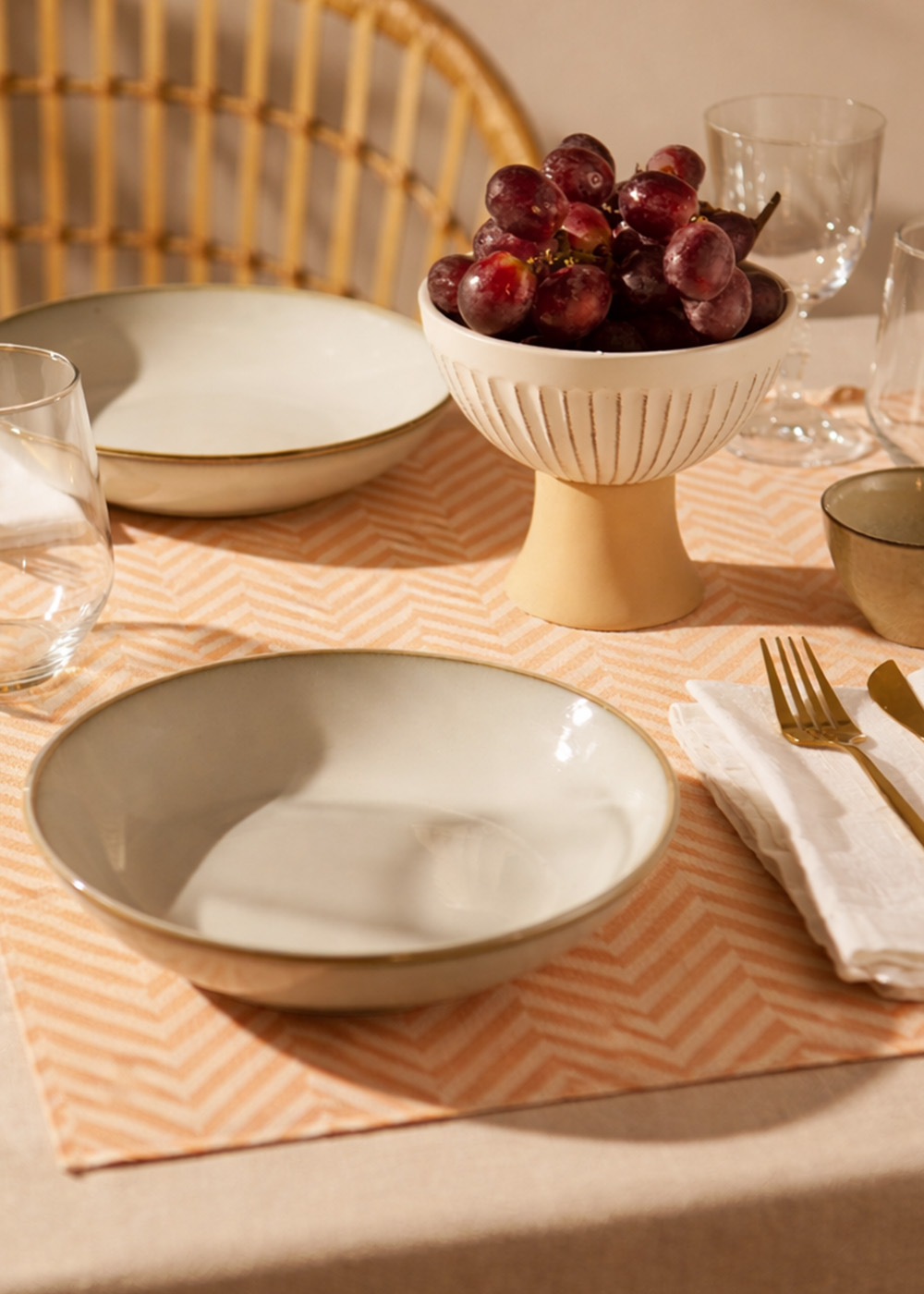 Geometric textile pattern in orange colorway.